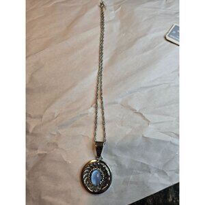 Silver-Tone Chain Necklace With Circular Pendant Featuring Blue Oval Stone